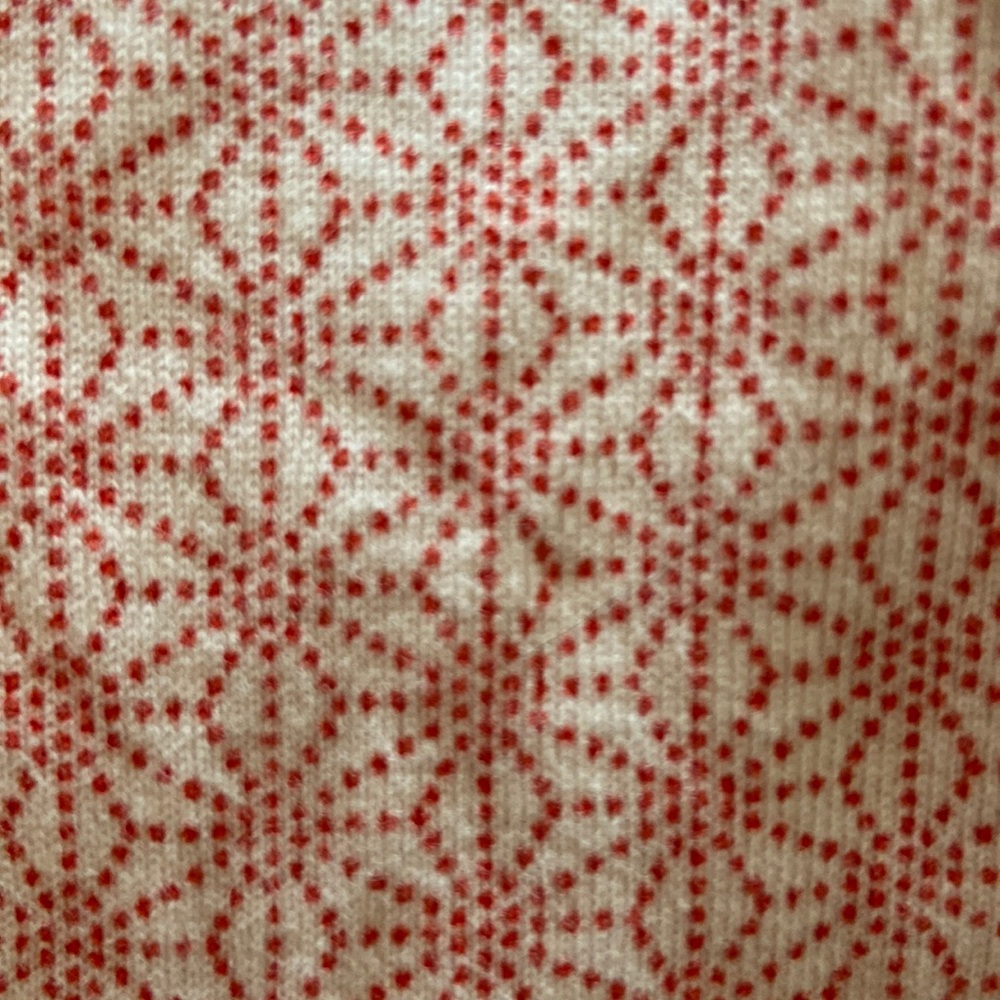 Tea Collection leggings.  White with red star-like pattern.  Girls 10.